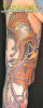 dali_melting_grandfather_clock_tattoo.JPG